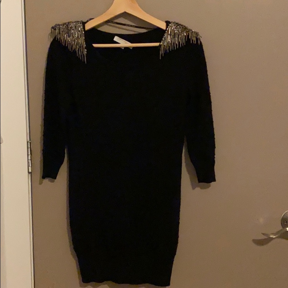 Sweater dress with shoulder embellishment
